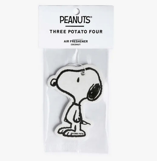 Snoopy air freshener in clear cellophane packaging. 