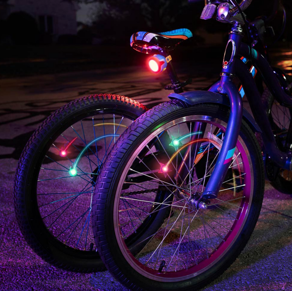 CometBrightz bike spoke lights on a bike at night.