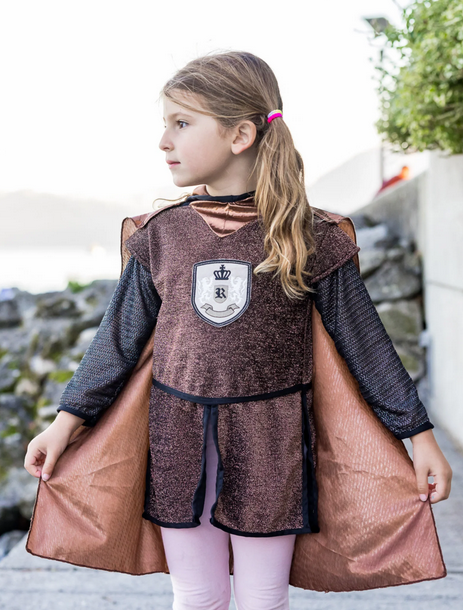 This set includes a hooded tunic and cape. The tunic is made of a beautiful sparkly brown fabric, with a lion emblem embellished on the front. The sleeves are made of chainmail-like fabric, and the hood and cape are made with beautiful iridescent copper spandex.