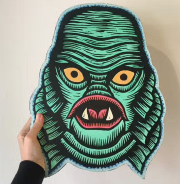 Creature from the Black Lagoon Woodcut Wall Art Print on Wood. Hand carved woodcut, hand printed on paper and mounted to wood. Painted with acrylic paint. 