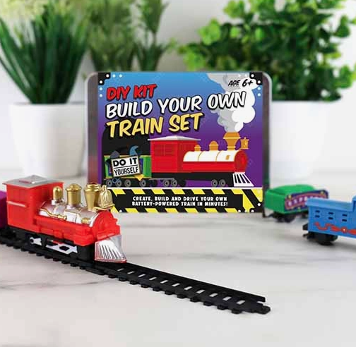 The DIY Train kit tin with partial track and engine. 