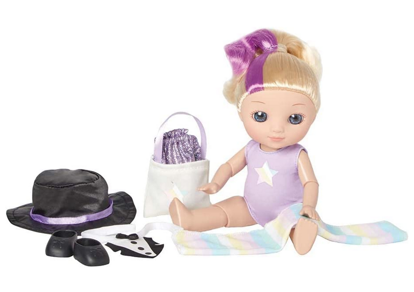 Madame Alexander Dance and Swim It's All About Me doll has blonde hair with a purple streak, light skin, and blue eyes. She comes with a purple leoptard with a silver star on the front as well as a dance outfir of a black hat, tuxedo bib, and black shoes. 