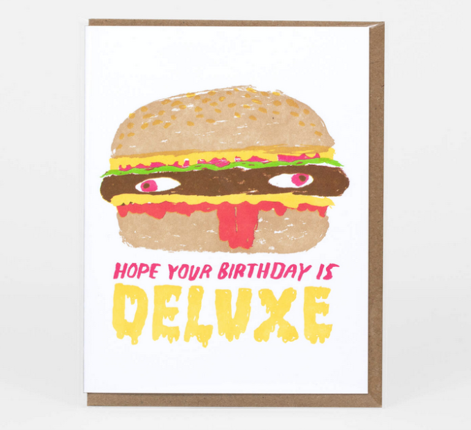 Illustration of a chesseburger with eyes and all the fixins' that reads "Hope Your Birthday is Deluxe" 