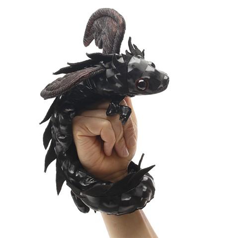 Dragon Wristlet puppet, black with red accents and unique holographic skin wrapped around a wrist. 