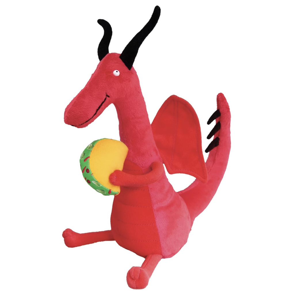 Red plush dragon with black horns and spiky tail. He's holding his taco to snack on. 