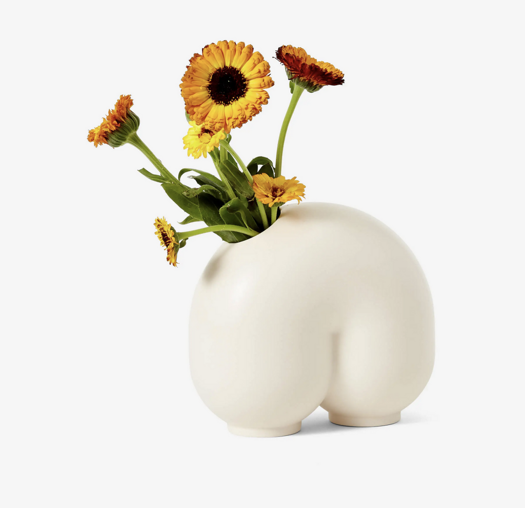 Matte white ceramic Enny Kirby abstract shaped vase.
