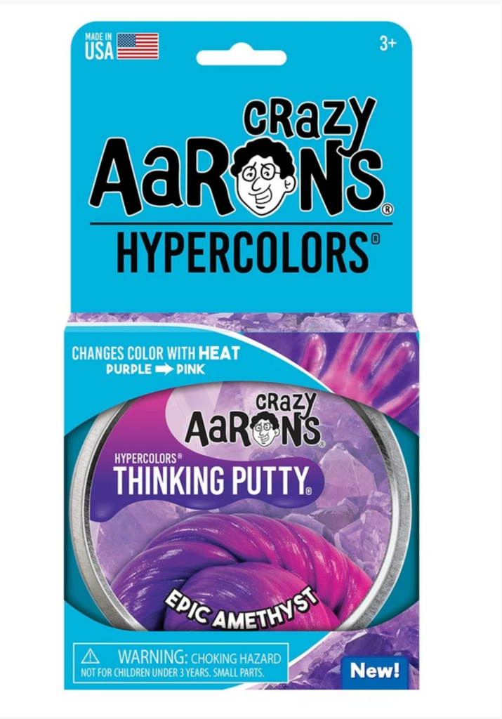 Box holding the tin of Epic Amethyst hypercolor Thinking Putty. The tin has a picture of the purple and pink color changing putty. 