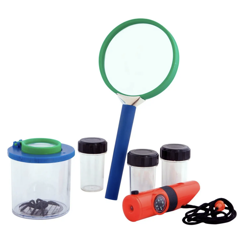 Outdoor explorer's set for kids with a magnifying glass, a whistle, compass, insect viewing jar, and 3 small vials.