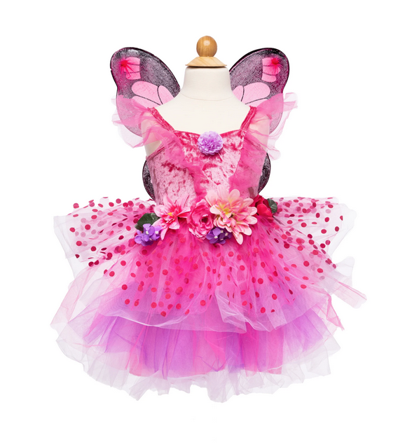 The Fairy Blooms Deluxe Dress & Wings is made with a crushed velour pink bodice and printed tulle skirt made from layers of hot pink and purple-colored tulle. At the waist, oversized large faux flowers and whimsical polka-dots adorn this fairy dress.  You get a glimpse of the matching wings worn by the mannequin.