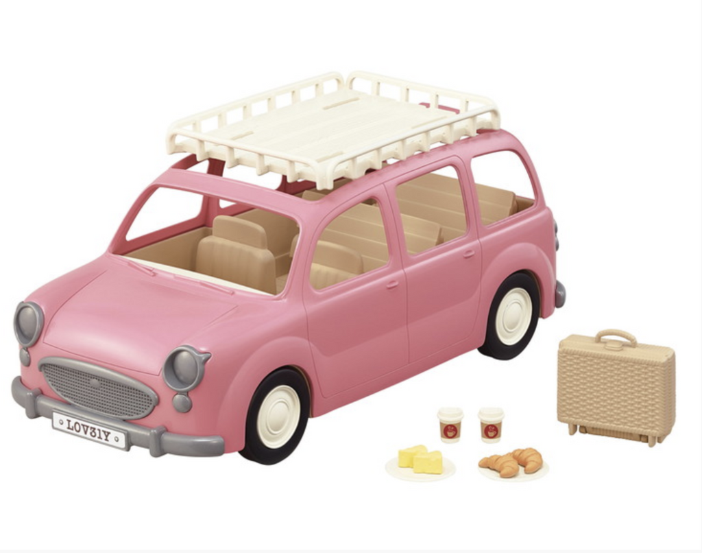 Calico critters pink family picnic van has a travel rack, seating for 8, a picnic baskets, cheese, croissants, drinks, and more.
