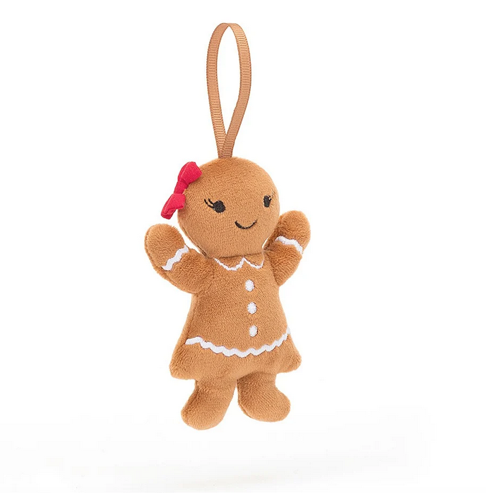 Festive Folly Gingerbread Ruby has a red cotton hair bow, embroidered lashes and a grosgrain loop.