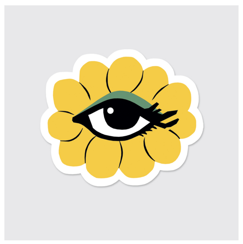 Sticker of a yellow flower with an eye inside.