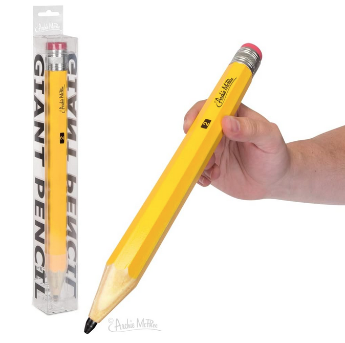 A hand holding the giant yellow wooden pencil.