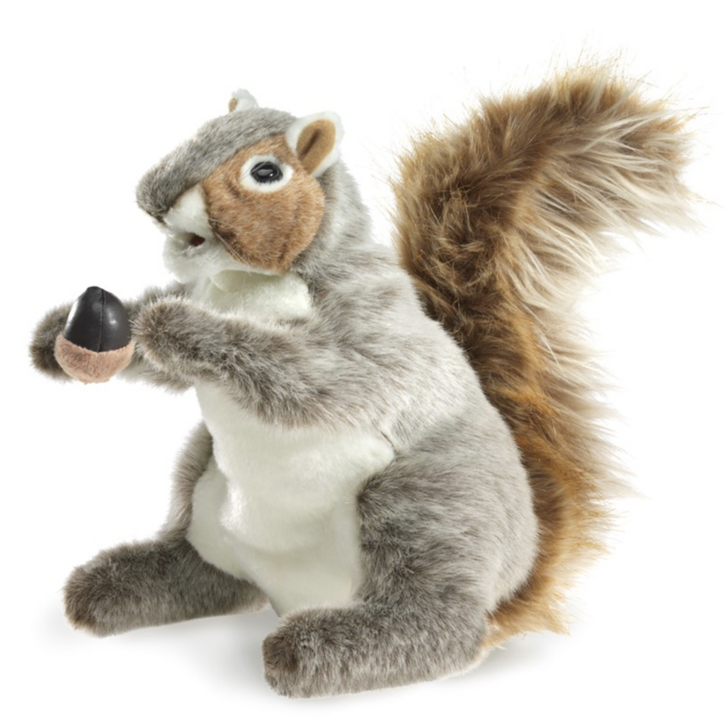 Plush grey squirrel hand puppet holding an acorn.
