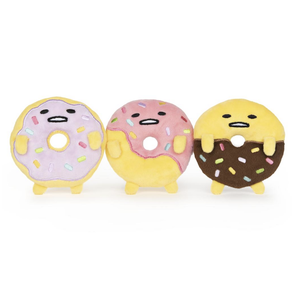 This set of three plush reimagines Gudetama as yummy sprinkled donuts, featuring glazed, strawberry dipped, & classic chocolate.