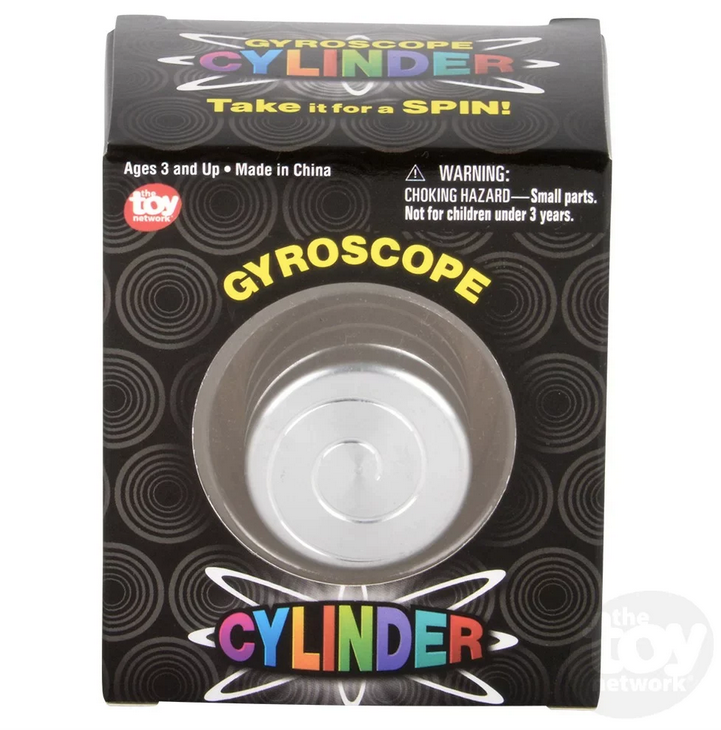 The Gyroscope Cylinder in it's box which is black with pictures of the cylinder and rainbow lettering. 