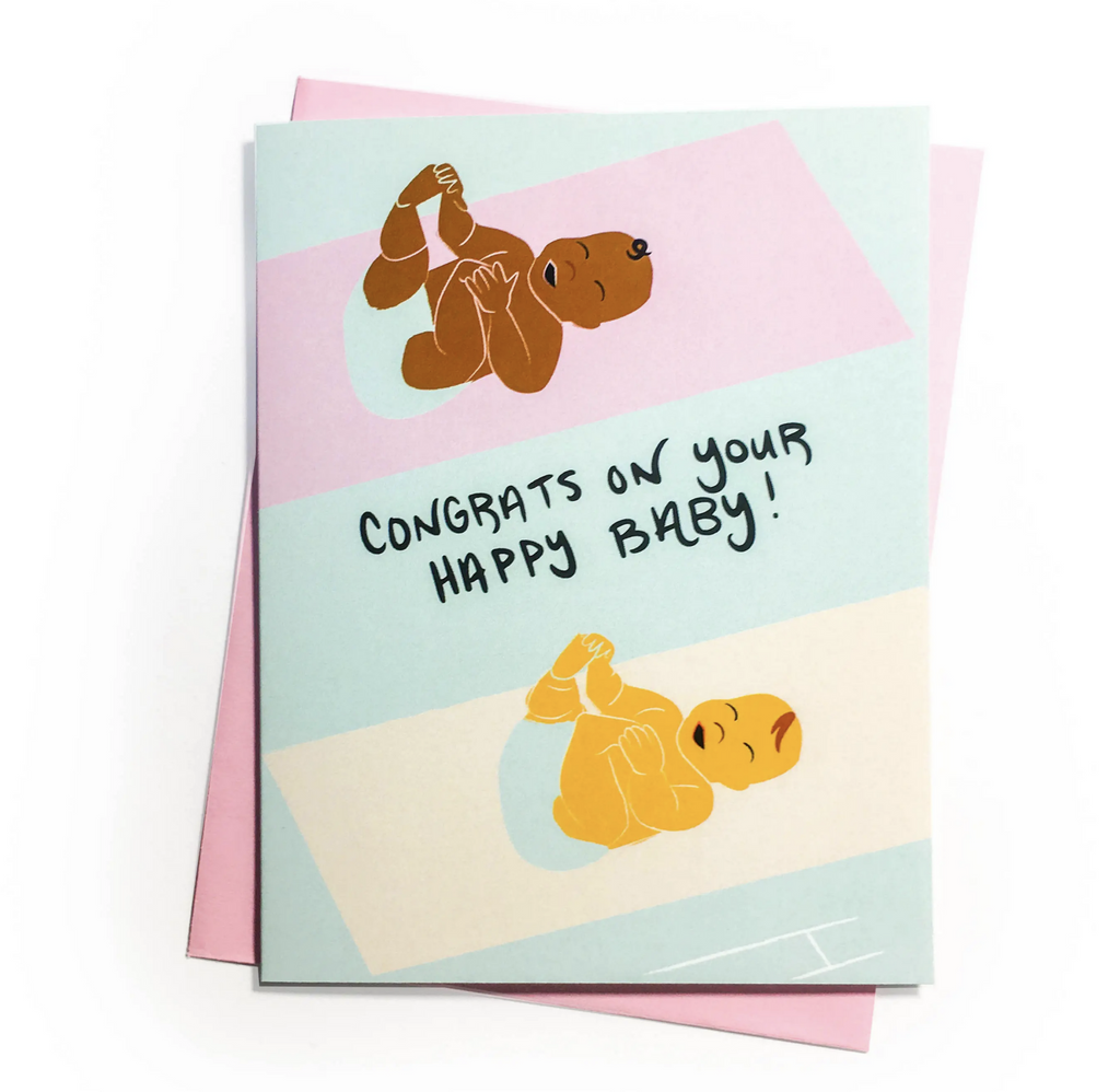 Greeting card that reads Congrats On Your Happy baby. Drawing of two infants smiling laying down holding their feet.