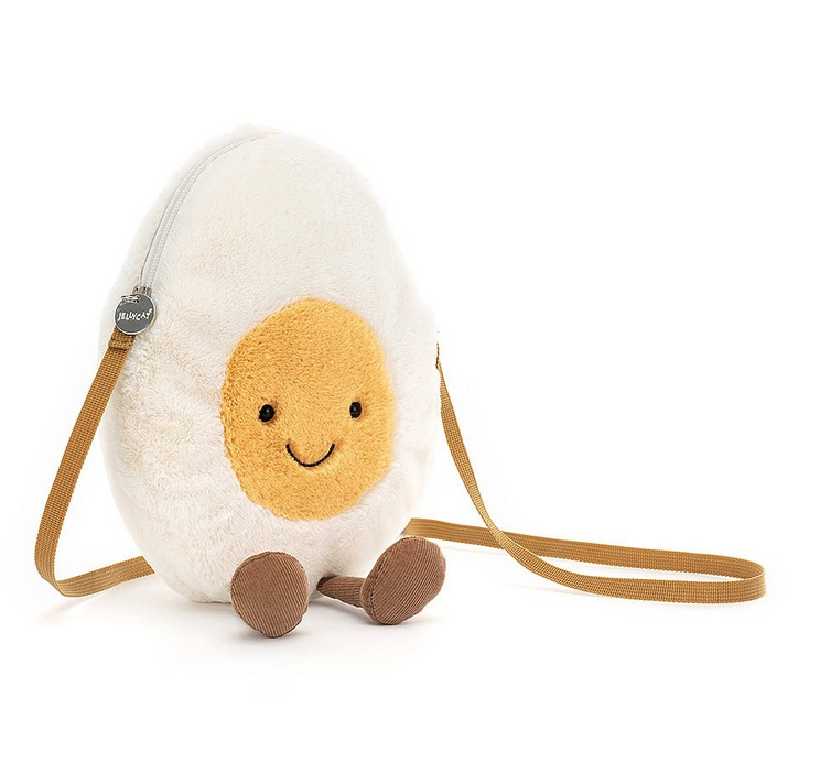 Amuseable Happy Boiled Egg Bag is smiley and sunny, with a strong mustard strap, soft white fur and a gorgeous golden yolk, this egg likes to dangle those adorable cord boots. 