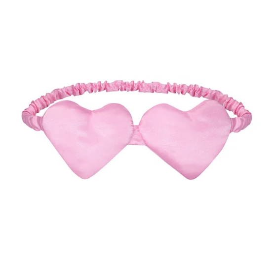 Pink satin heart shaped eye sleep mask.