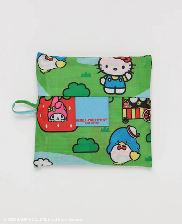 Hello Kitty and Friends Standard Baggu packed into it's pouch. You get a glimpse of Hello Kitty, Sam, and My Melody. 
