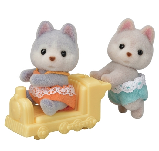 Super cute Calico Critters Husky twins playing with a train ride on. 
