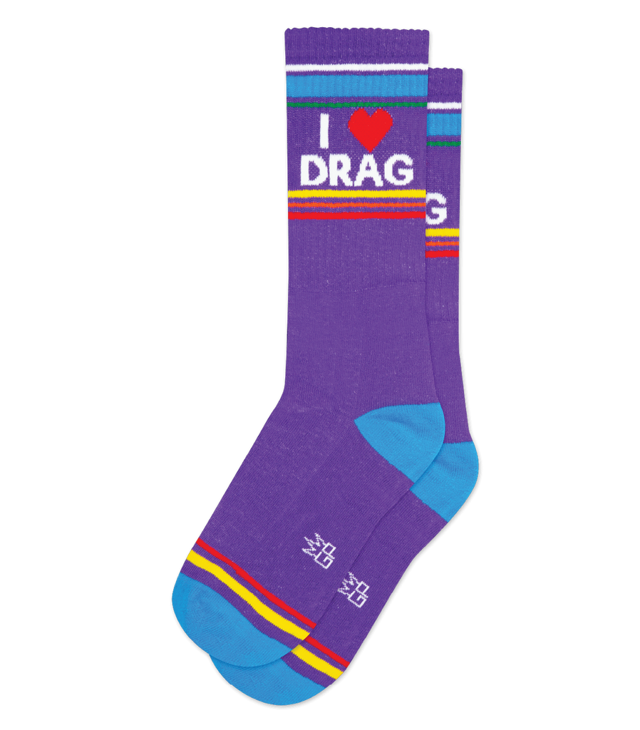 These super-comfy, unisex, one-size-fits-most, I Love Drag Gym Socks are made in the USA of Purple Cotton with accents of Kelly Green Nylon, Light Blue Nylon, Orange Nylon, Red Nylon, Yellow Nylon, Optic White Nylon. Machine wash cold, line dry.  61% Cotton, 36% Nylon, 3% Spandex.  