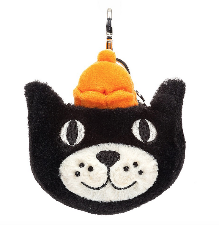 The Jellycat mascot bag charm featuring kitty's black face with white around his mouth and nose and orange hat as well as the  Jellycat name disc and silver claw clip