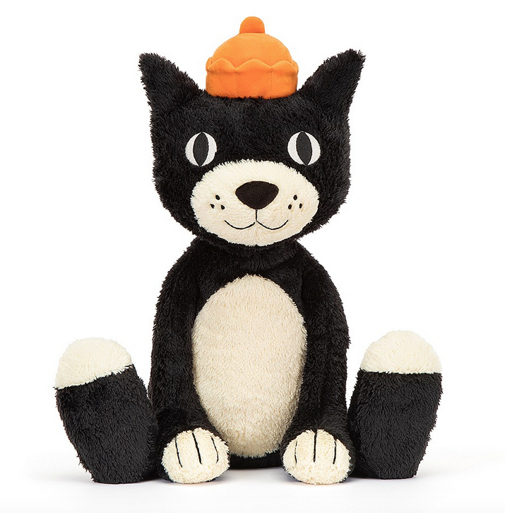 The huge sized Jellycat Jack plush facing forward and sitting up. He's got soft black fur with a white tummy, mouth and nose and white tipped toes. 