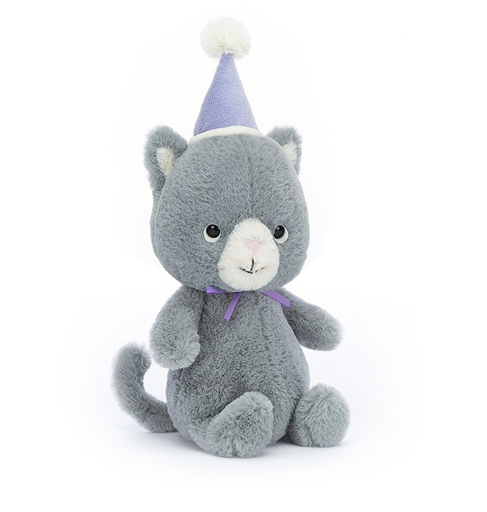 Grey plush cat wearing a purple party hat by Jellycat.
