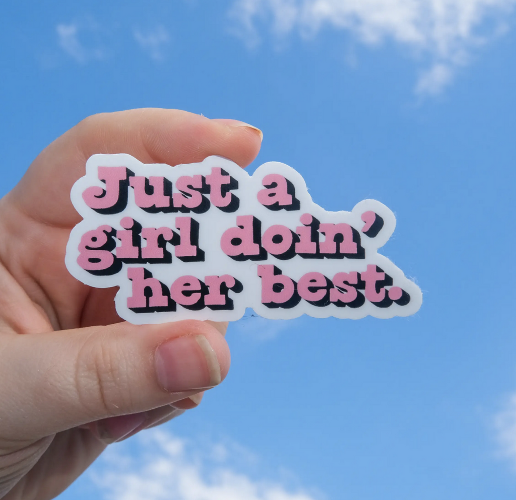 Diecut white sticker that reads Just A Girl Doin' Her Best in pink.