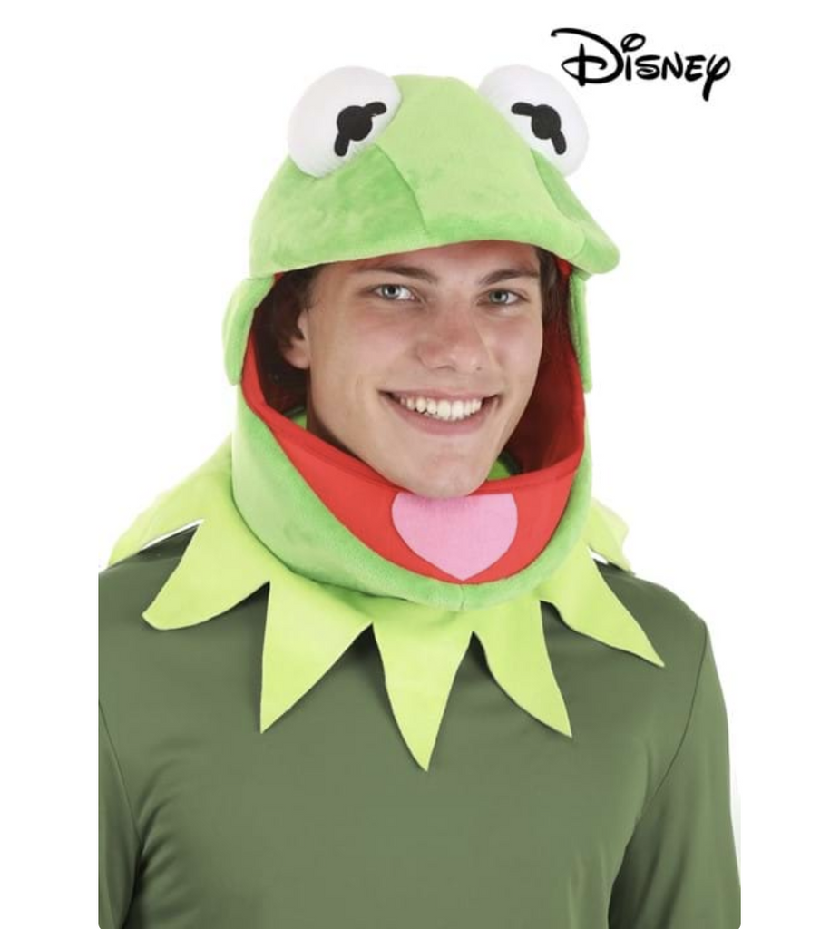 The Kermit Jawsome Hat and Collar has soft sculpted eyes on top, appliqued tongue on lower jaw, jagged collar sewn to lower edge and is being worn by an adult. 