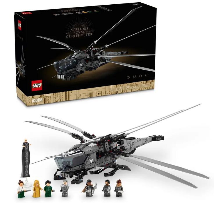 The LEGO Icons Atreides Royal Ornithopter set built with the minifigures standing in front of the box. 