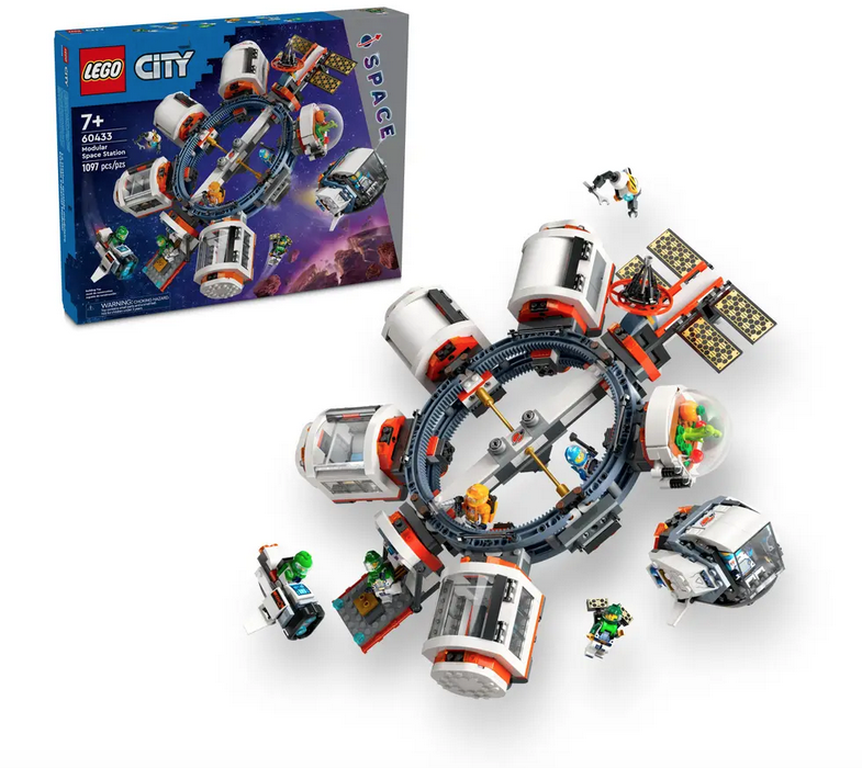 The LEGO City Modular Space Station model playset. Once built this futuristic space ring is an orbiting anchor for all eight components of the space station. The box is in the background. 