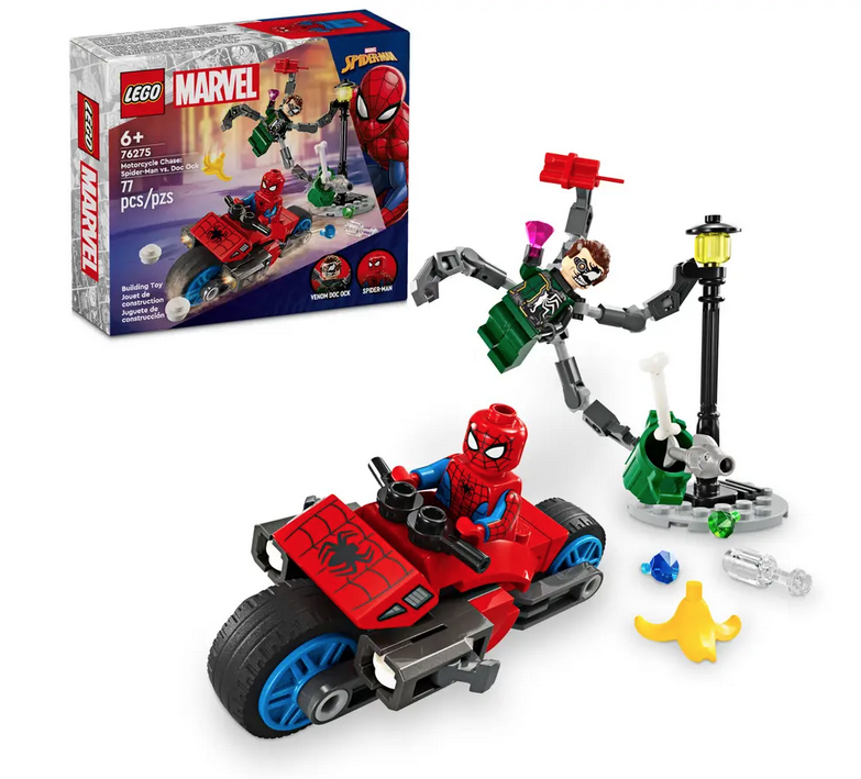 LEGO SpiderMan minifigure in his motorcycle driving away from Dr. Ock minifigure posed and swinging from a street lamp, with the LEGO box in the background. 