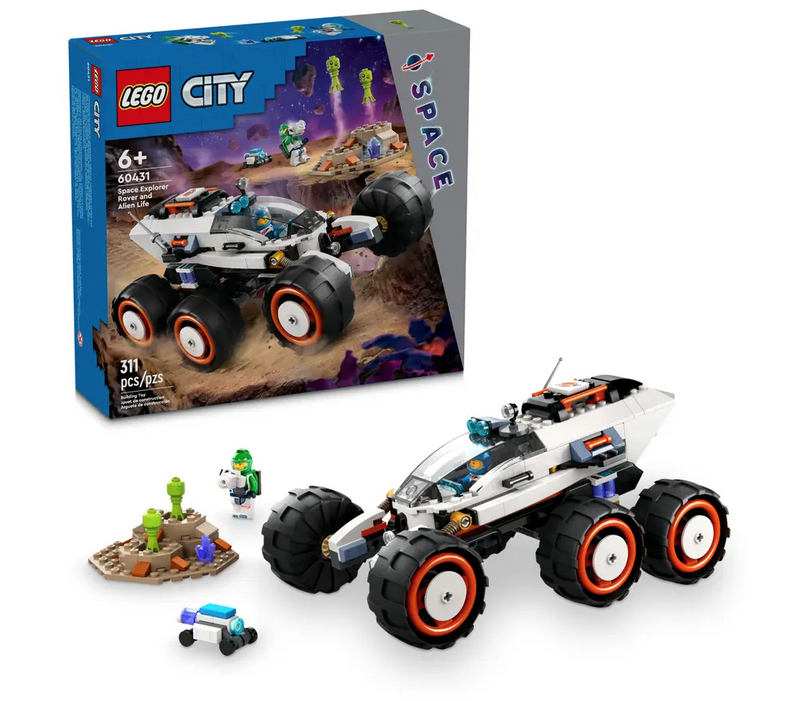 The LEGO Explorer Rover vehicle, minifigure crew members,robot and alien figures, with the box in the background. 