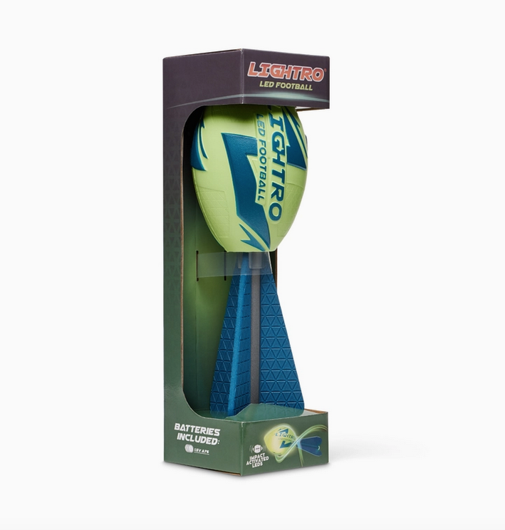 Lightro LED Glow Football packaged in an open box. The football is fluorescent yellow woth blue lettering and the tail is blue. 