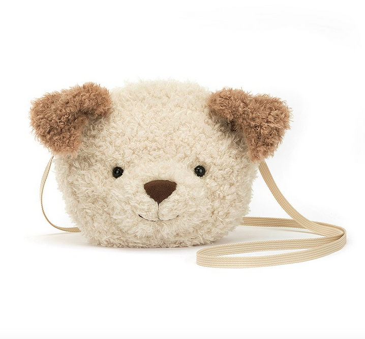 Plush puppy face purse. The puppy has cream colored fur on his face and brown floppy ears. 
