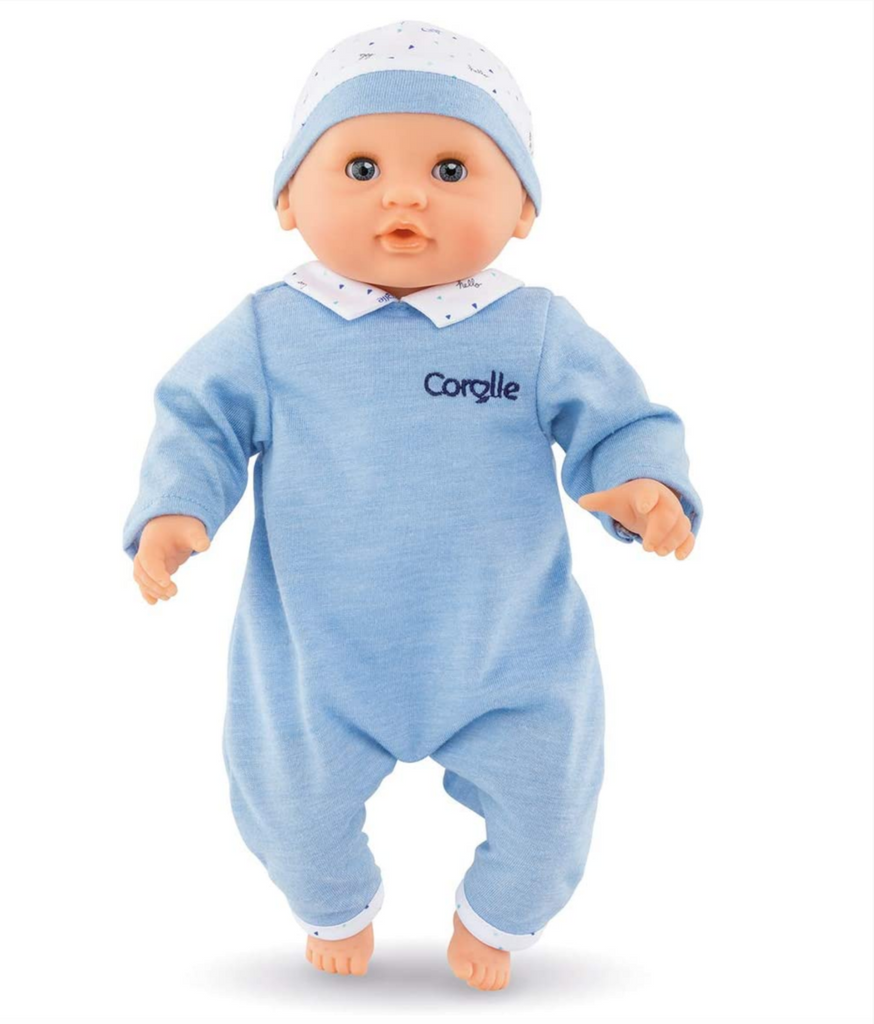 The Mael Bebe Calin doll is dressed in blue pajamas and is wearing a matching hat. 