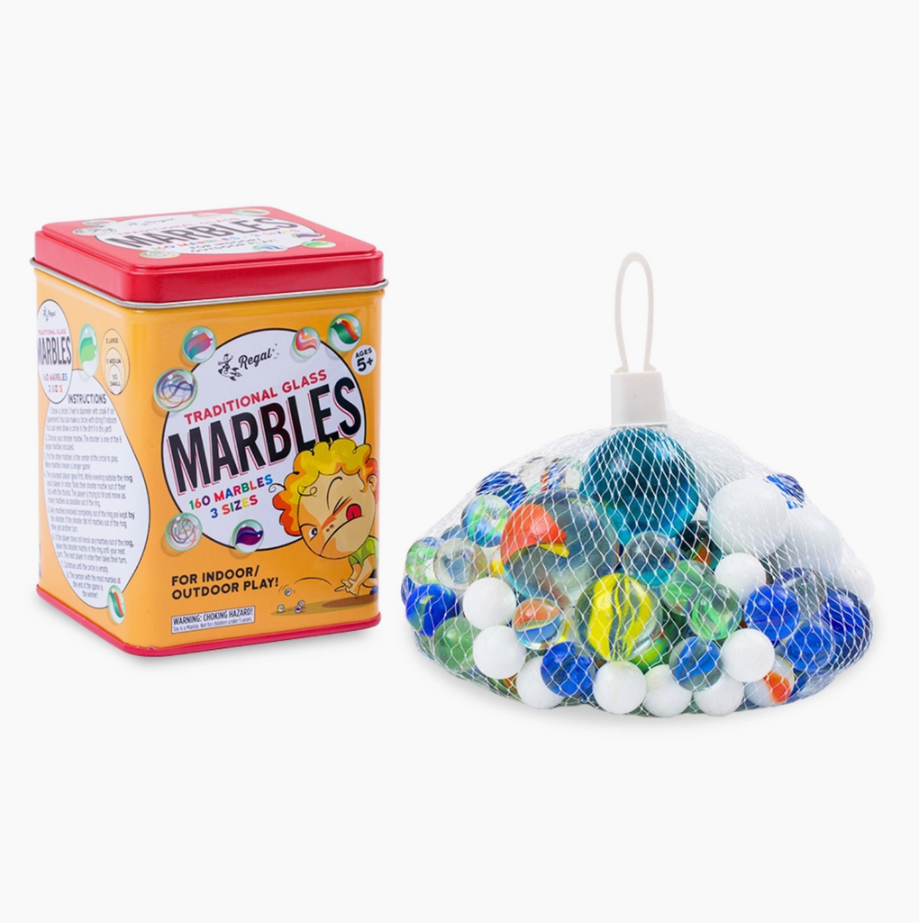 Tin of traditional glass marbles for indoor/outdoor play nexdt to a white net bag of 160 glass marbles.