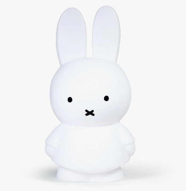 Front view of standing all white Miffy figure coin bank. 