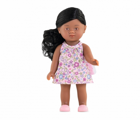 Rosaly mini corolline doll. Dark skin with long brown hair in a pink floral dress.