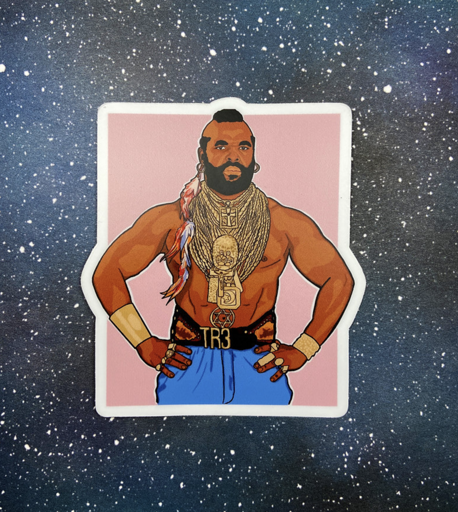 Sticker of Mr. T shirtless with tons of gold chains, feather in his hair.