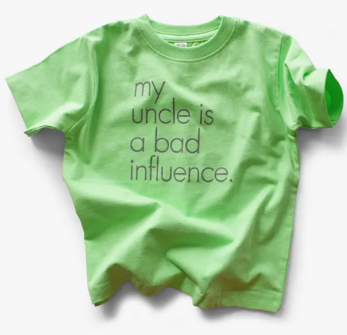 Green toddler t-shirt that reads "My Uncle is a bad influence"
