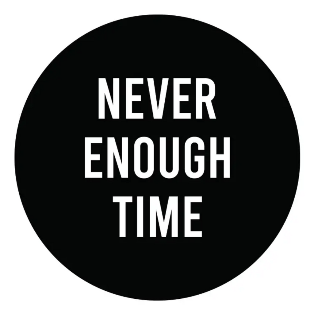 Round black sticker reads "Never Enough Time" in white text.