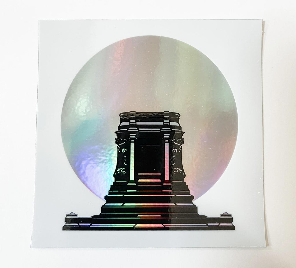White square vinyl sticker with an image of the former Lee Monument pedestal minus the former statue on top in black in Richmond, VA. Behind the pedestal is a holographic silver circle. That area is now called Marcus-David Peters Circle.