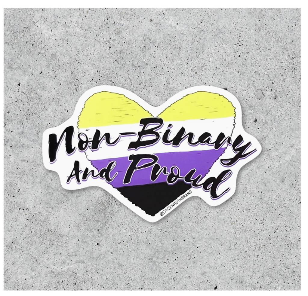 Diecut heart sticker with binary flag colors. Black text reads "Non-Binary and Proud."
