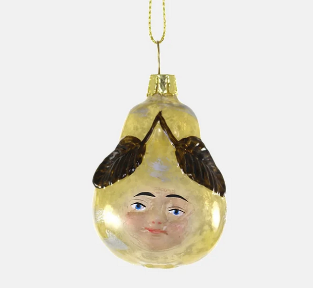 Pear shaped ornament is adorned with leaves and a cherub-like face. Beautifully finished with mottling to detail pear skin.