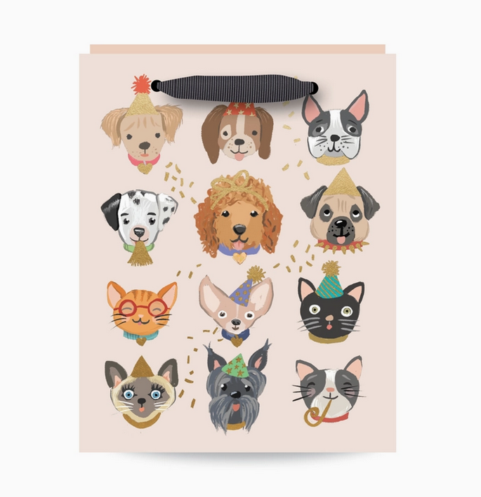 Pet Faces Gift bag laying flat with nothing inside. There are illustrations of 9 different festive pet faces. 