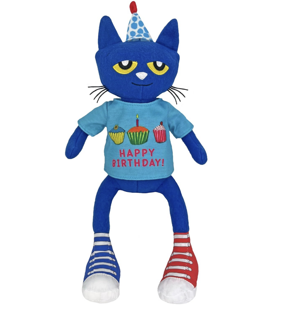 Plush Pete the Cat with his one red and one blue shoes, wearing a t-shirt that has three cupcakes and reads "Happy Birthday!" He is also wearing a white with blue polka dots birthday hat.
