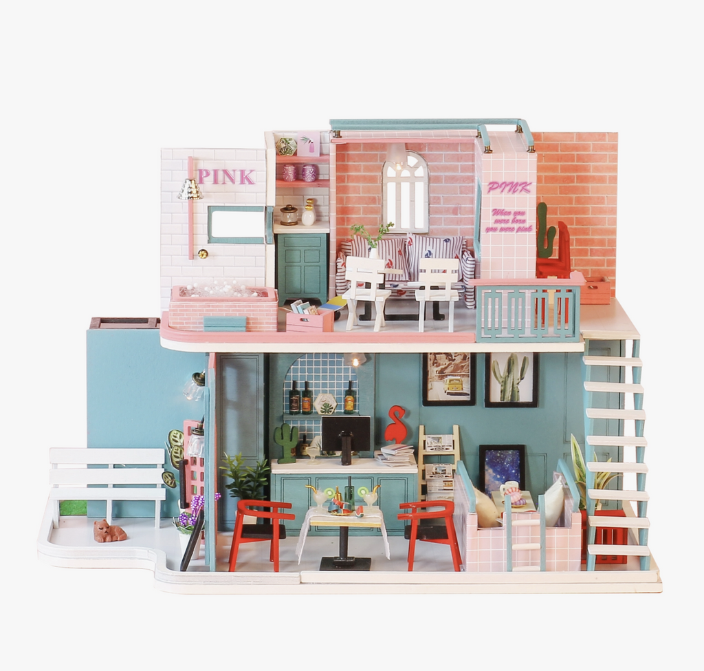Pionk Cafe DIY Miniature House kit. Cafe has two levels wirth sitting areas, room decor, stairs, a bench, and more.